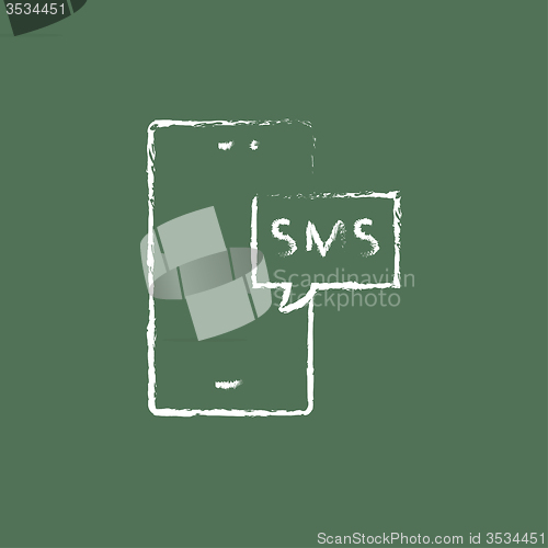 Image of Touch screen phone with message icon drawn in chalk.