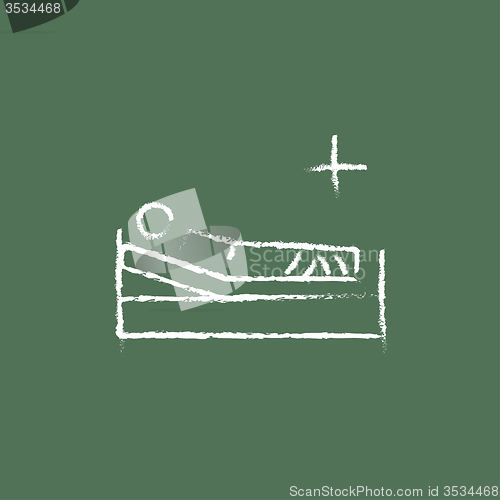 Image of Patient lying on the bed icon drawn in chalk.