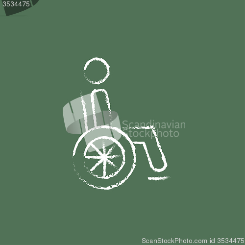 Image of Disabled person icon drawn in chalk.