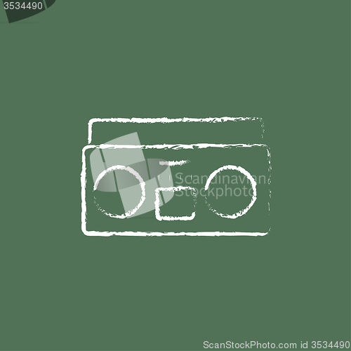 Image of Cassette player icon drawn in chalk.