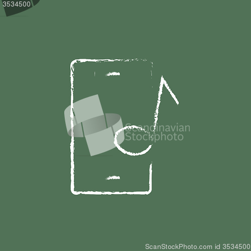 Image of Smartphone with music note icon drawn in chalk.
