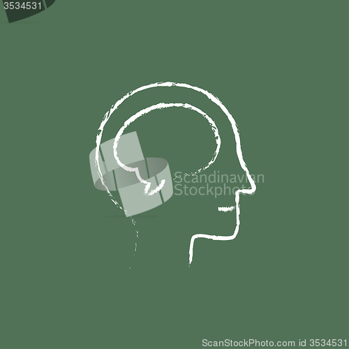 Image of Human head with brain icon drawn in chalk.