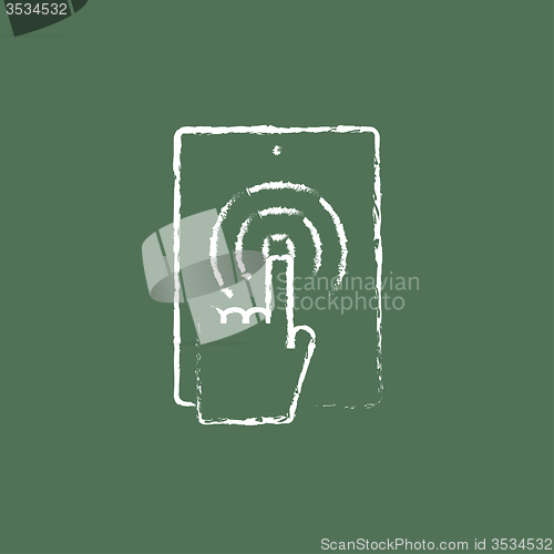Image of Touch screen tablet icon drawn in chalk.