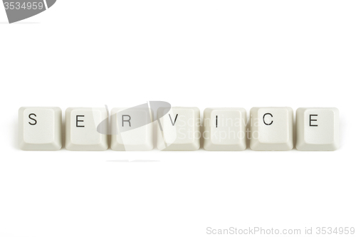 Image of service from scattered keyboard keys on white