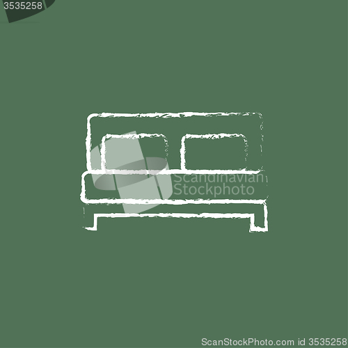 Image of Sofa icon drawn in chalk.