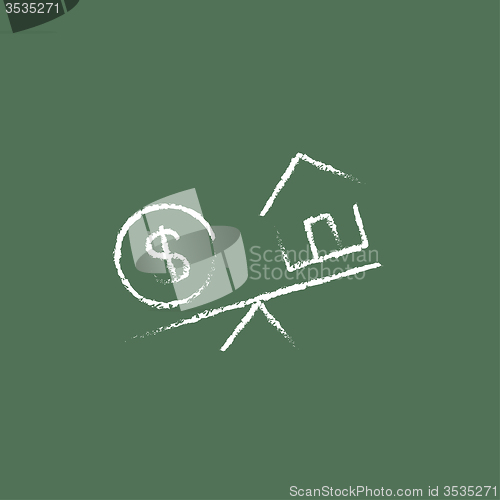 Image of House and dollar symbol on scales icon drawn in chalk.