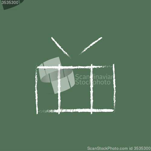 Image of Drum with sticks icon drawn in chalk.