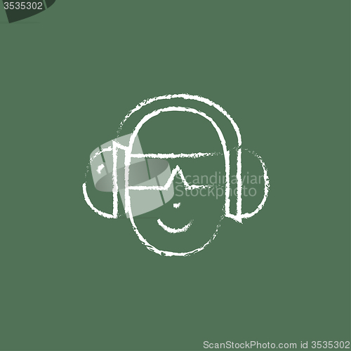 Image of Man in a headphones icon drawn chalk.