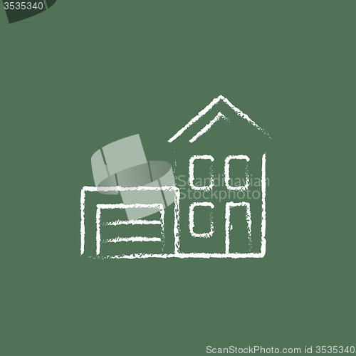 Image of House with garage icon drawn in chalk.