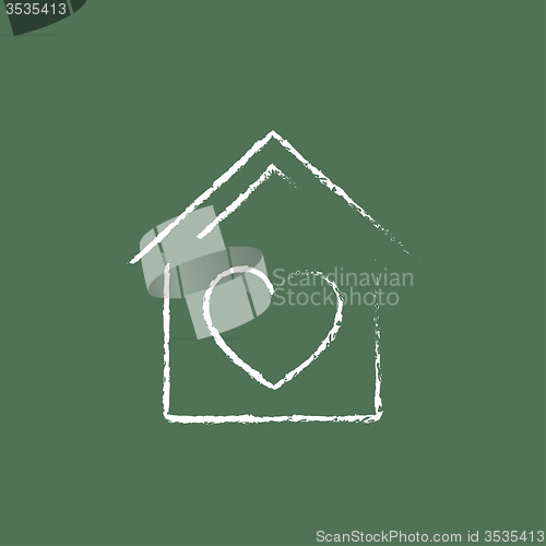 Image of House with heart symbol icon drawn in chalk.