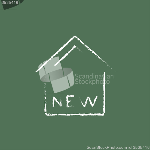 Image of New house icon drawn in chalk.