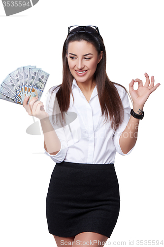 Image of Happy business woman with us dollar