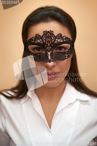 Image of Closeup of a woman in lacy mask