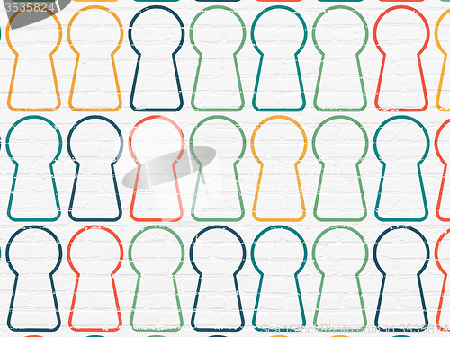 Image of Privacy concept: Keyhole icons on wall background
