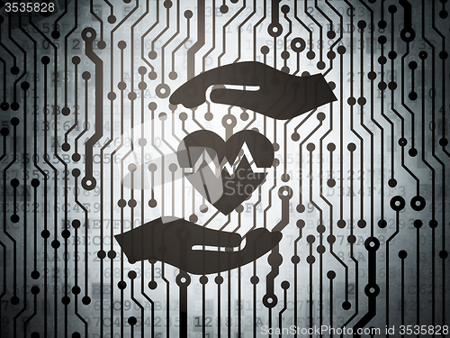 Image of Insurance concept: circuit board with Heart And Palm