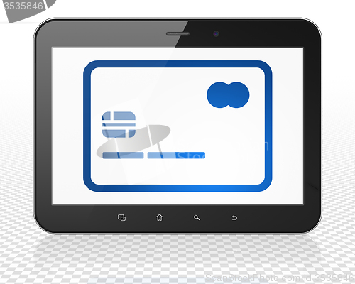 Image of Money concept: Tablet Pc Computer with Credit Card on display