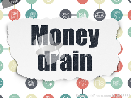 Image of Money concept: Money Drain on Torn Paper background