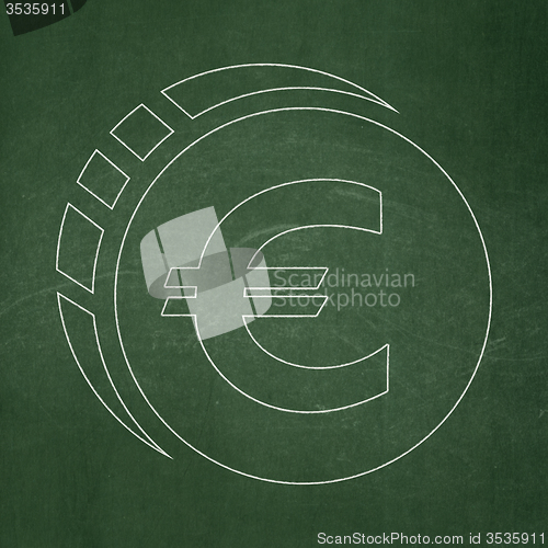 Image of Banking concept: Euro Coin on chalkboard background