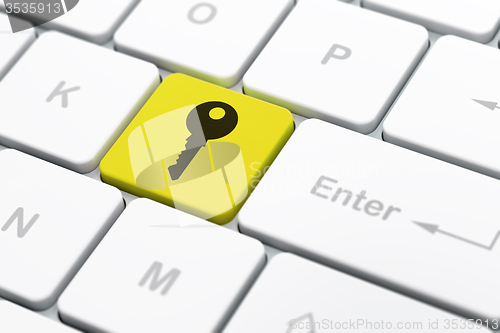 Image of Protection concept: Key on computer keyboard background