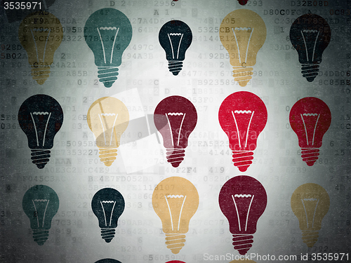 Image of Finance concept: Light Bulb icons on Digital Paper background