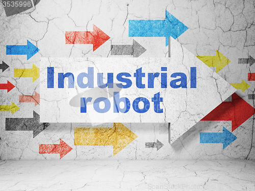 Image of Manufacuring concept: arrow with Industrial Robot on grunge wall background