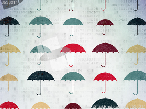 Image of Protection concept: Umbrella icons on Digital Paper background