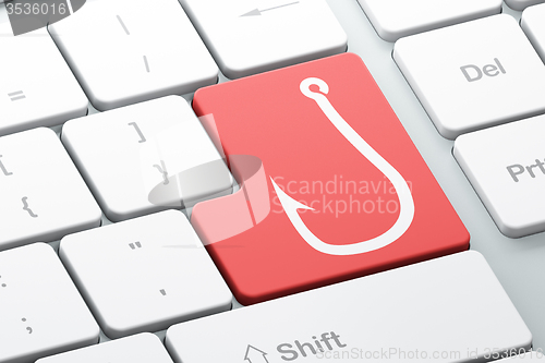 Image of Safety concept: Fishing Hook on computer keyboard background