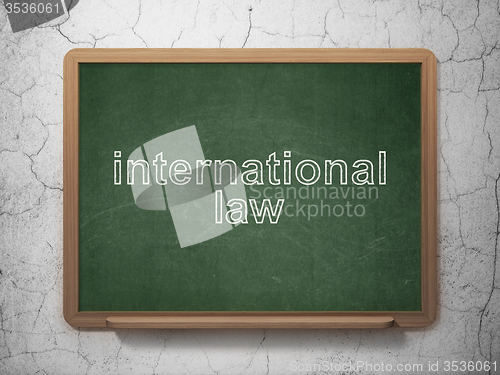 Image of Political concept: International Law on chalkboard background