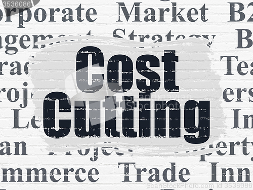 Image of Finance concept: Cost Cutting on wall background