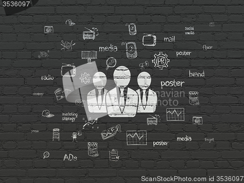 Image of Marketing concept: Business People on wall background