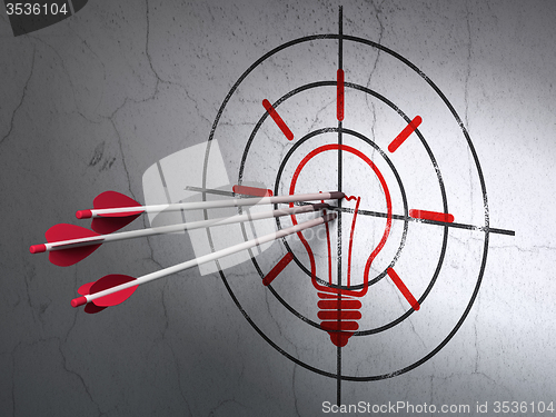 Image of Finance concept: arrows in Light Bulb target on wall background