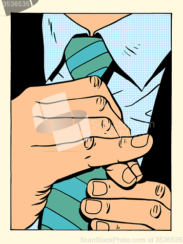 Image of gentleman straightens tie