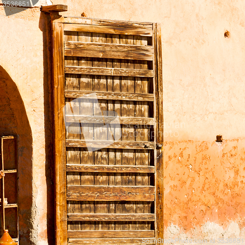 Image of old door in morocco africa ancien and wall ornate brown