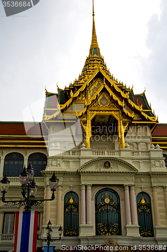 Image of  thailand asia   in  bangkok rain  temple flag street lamp    mo