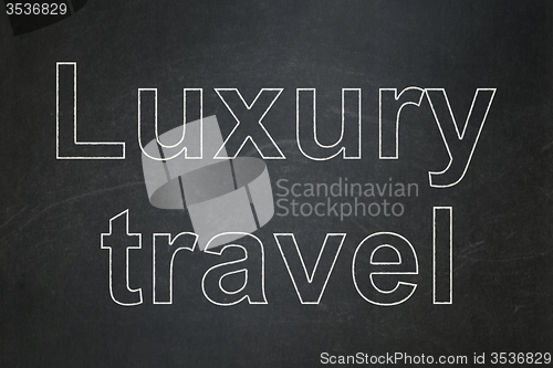 Image of Travel concept: Luxury Travel on chalkboard background