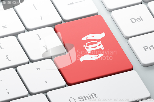Image of Insurance concept: Car And Palm on computer keyboard background
