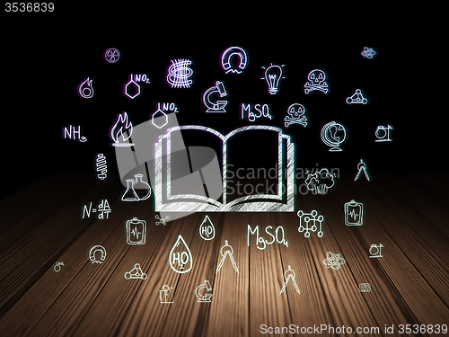 Image of Science concept: Book in grunge dark room
