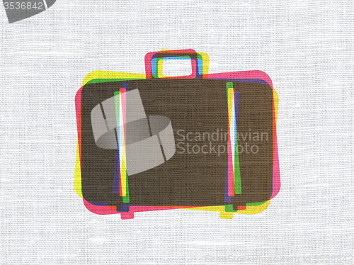 Image of Travel concept: Bag on fabric texture background