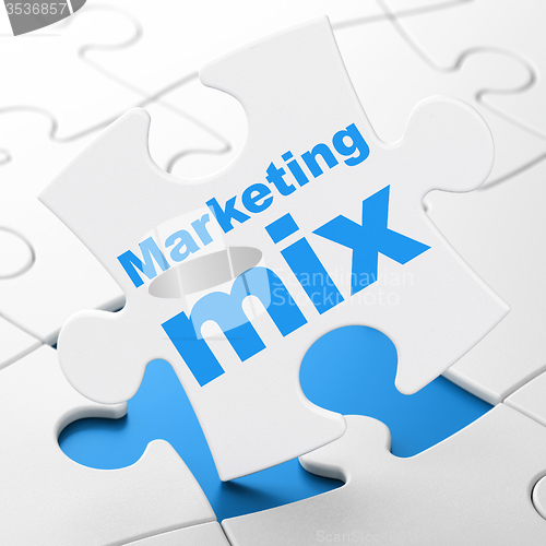 Image of Marketing concept: Marketing Mix on puzzle background