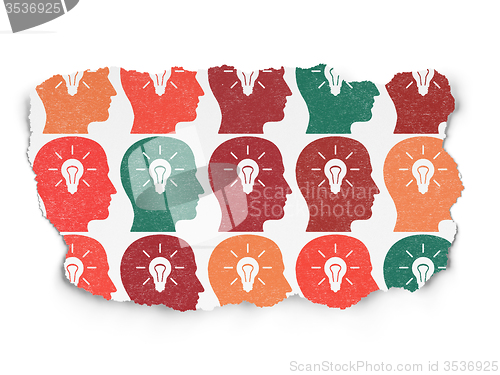Image of Studying concept: Head With Light Bulb icons on Torn Paper background