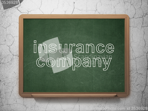 Image of Insurance concept: Insurance Company on chalkboard background
