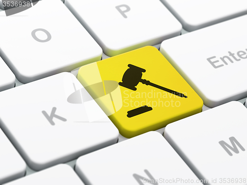 Image of Law concept: Gavel on computer keyboard background