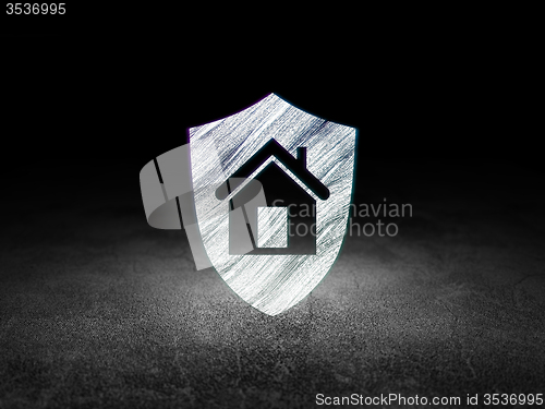 Image of Business concept: Shield in grunge dark room