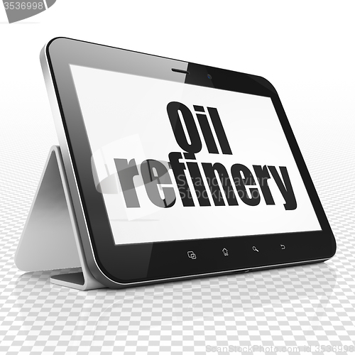 Image of Manufacuring concept: Tablet Computer with Oil Refinery on display