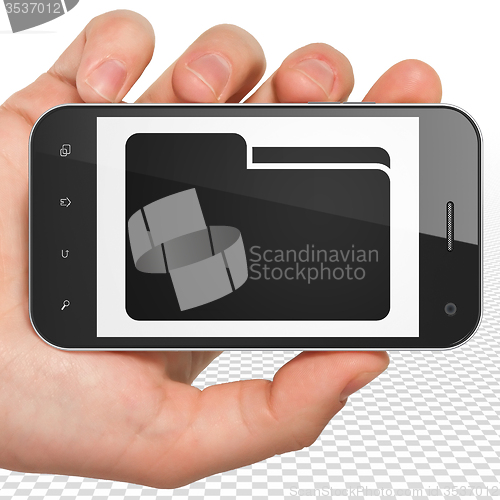 Image of Business concept: Hand Holding Smartphone with Folder on display