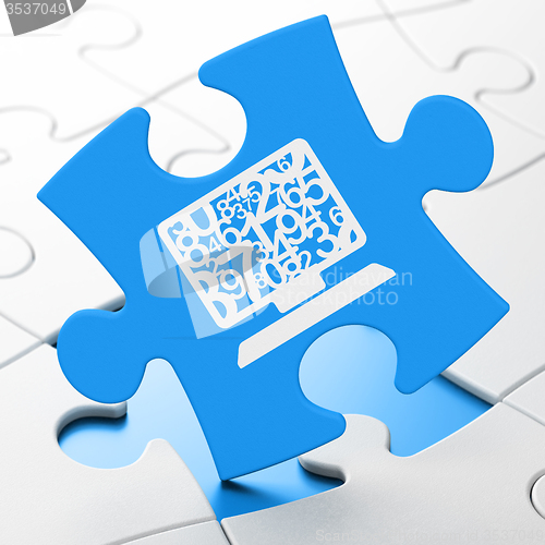 Image of Education concept: Computer Pc on puzzle background