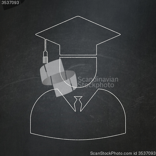 Image of Science concept: Student on chalkboard background
