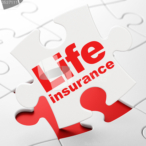 Image of Insurance concept: Life Insurance on puzzle background