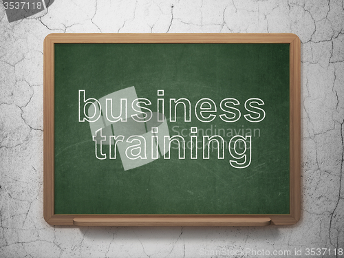 Image of Education concept: Business Training on chalkboard background