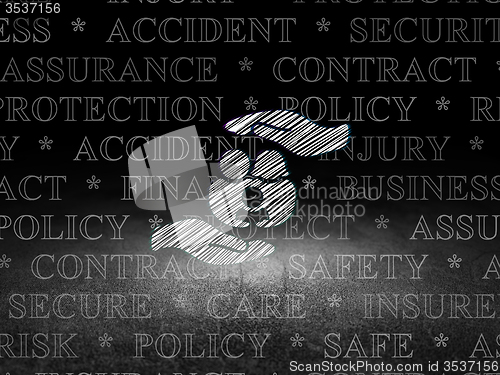 Image of Insurance concept: Family And Palm in grunge dark room